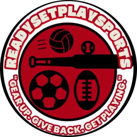 Logo for ReadySetPlaySports featuring a red circle with sports equipment icons including a volleyball, soccer ball, football, and a hockey stick, with the website URL and slogan 'Gear Up. Give Back. Get Playing.'