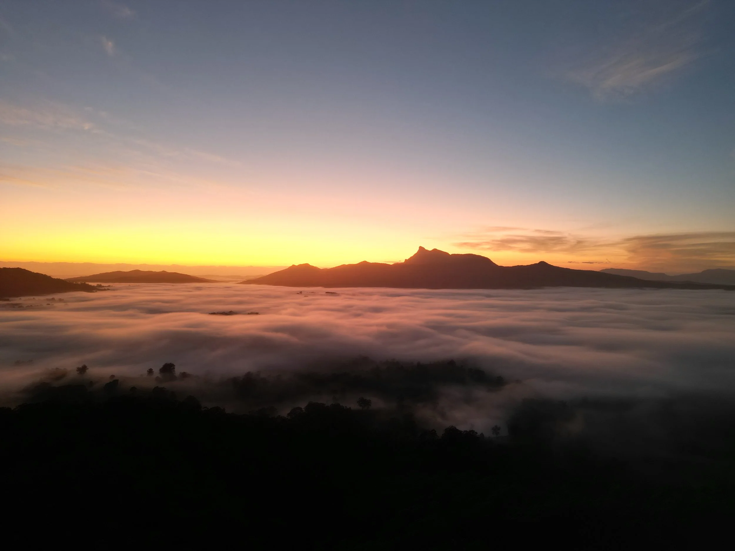 Sunrise behind the mountains.