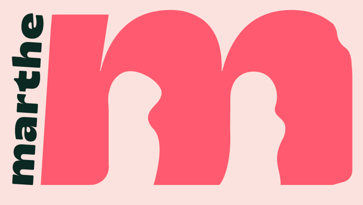 The image features the word "manhattan" written vertically on the left side and the letters "m" and "n" in large stylized pink font on the right side with a light pink background.