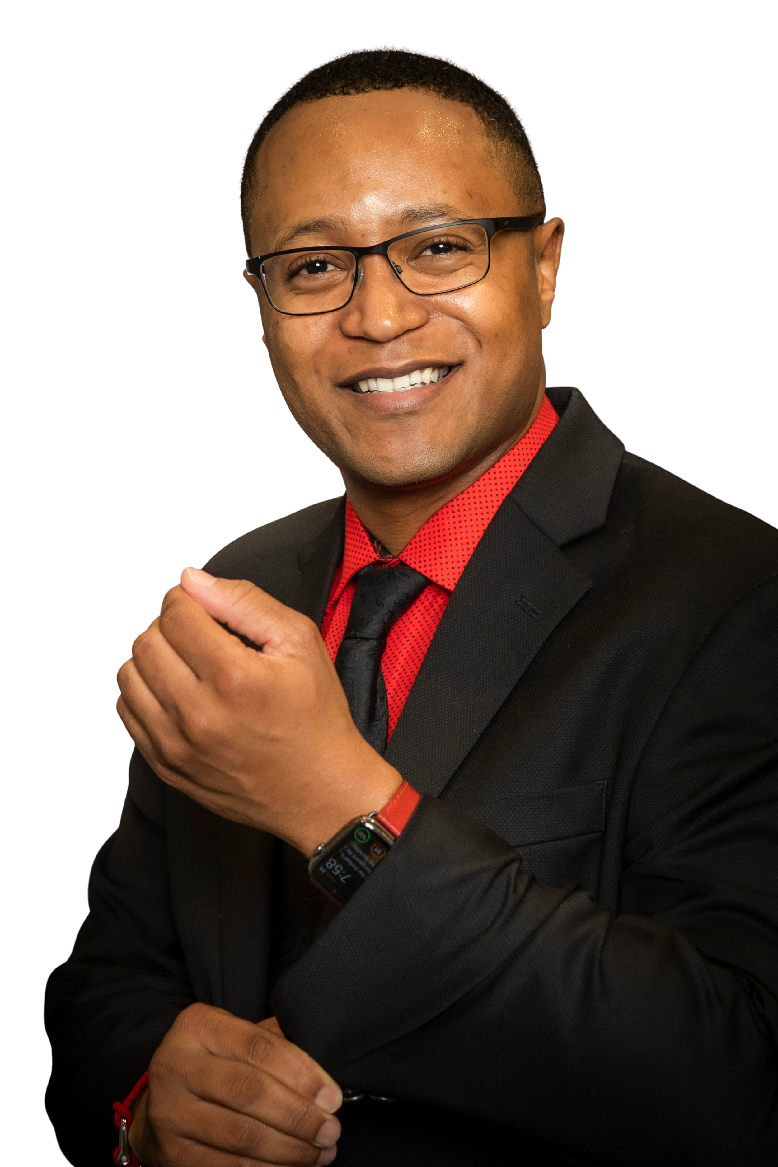 Morris Anderson IV, coach and U.S. Army veteran, smiling in a dark suit and red shirt