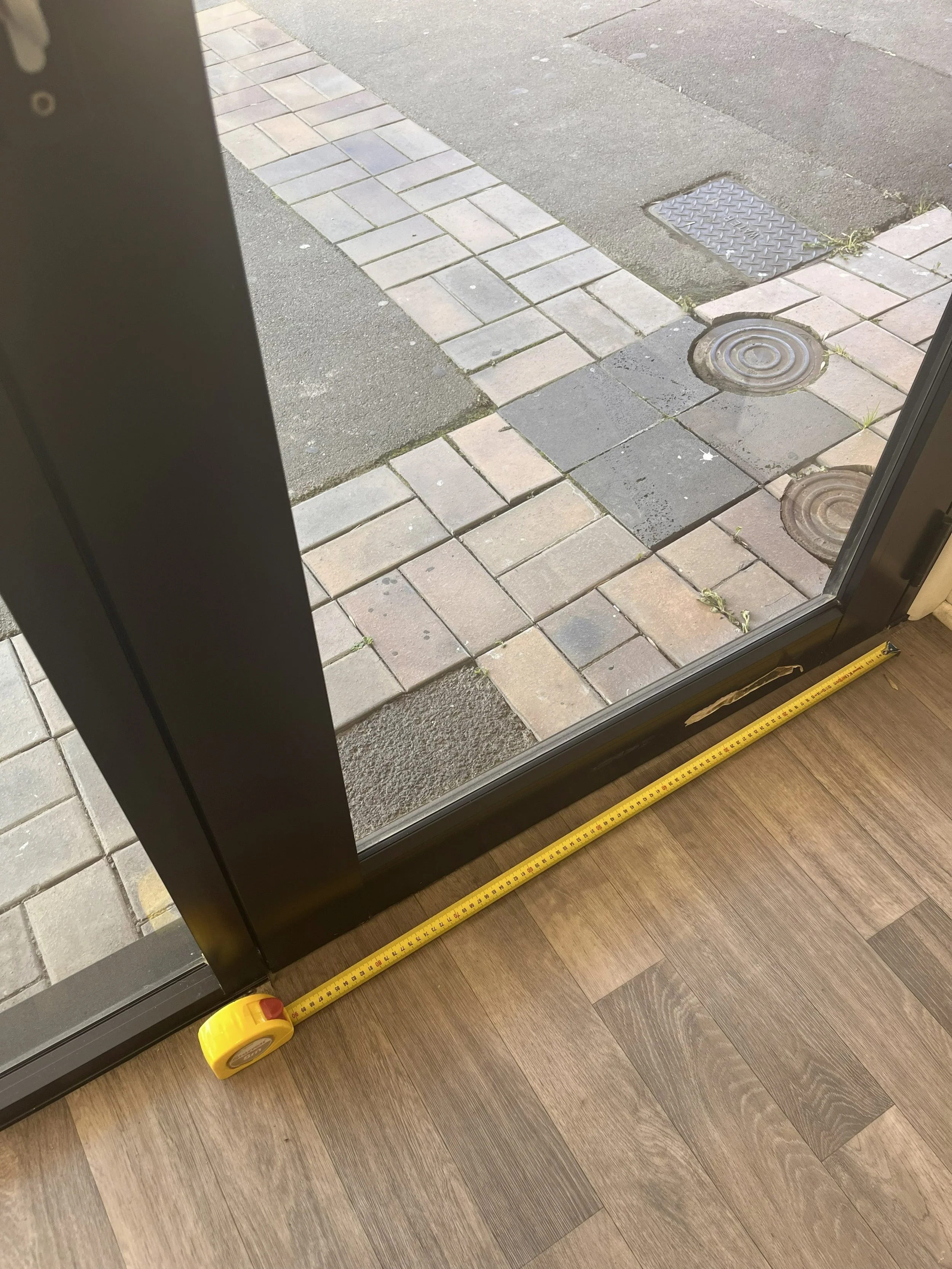 measuring tape on floor by front door of HBOT NZ