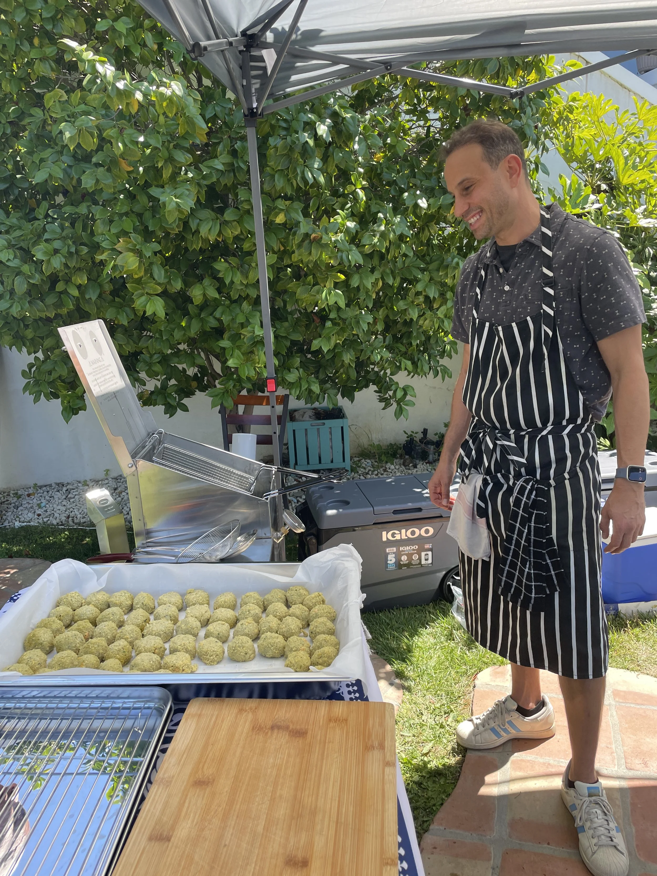 Head Chef Jeremy admiring Falafel Balls
