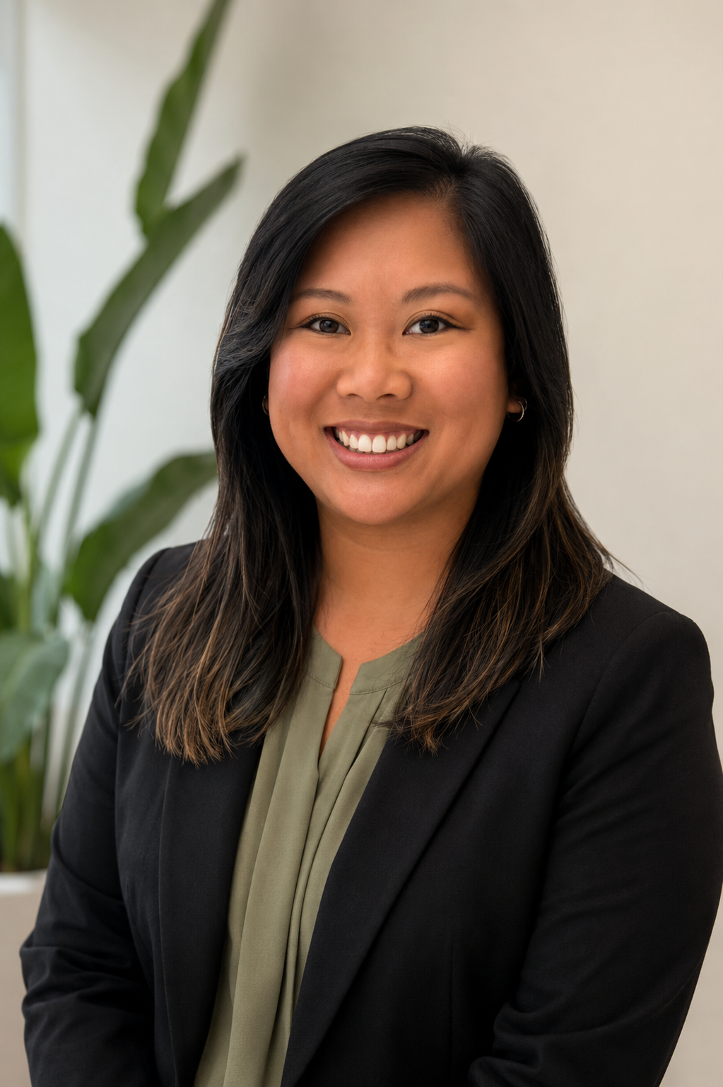 Professional headshot of Jamie Kanburoglu, owner and manager of The Planner's Studio Co.
