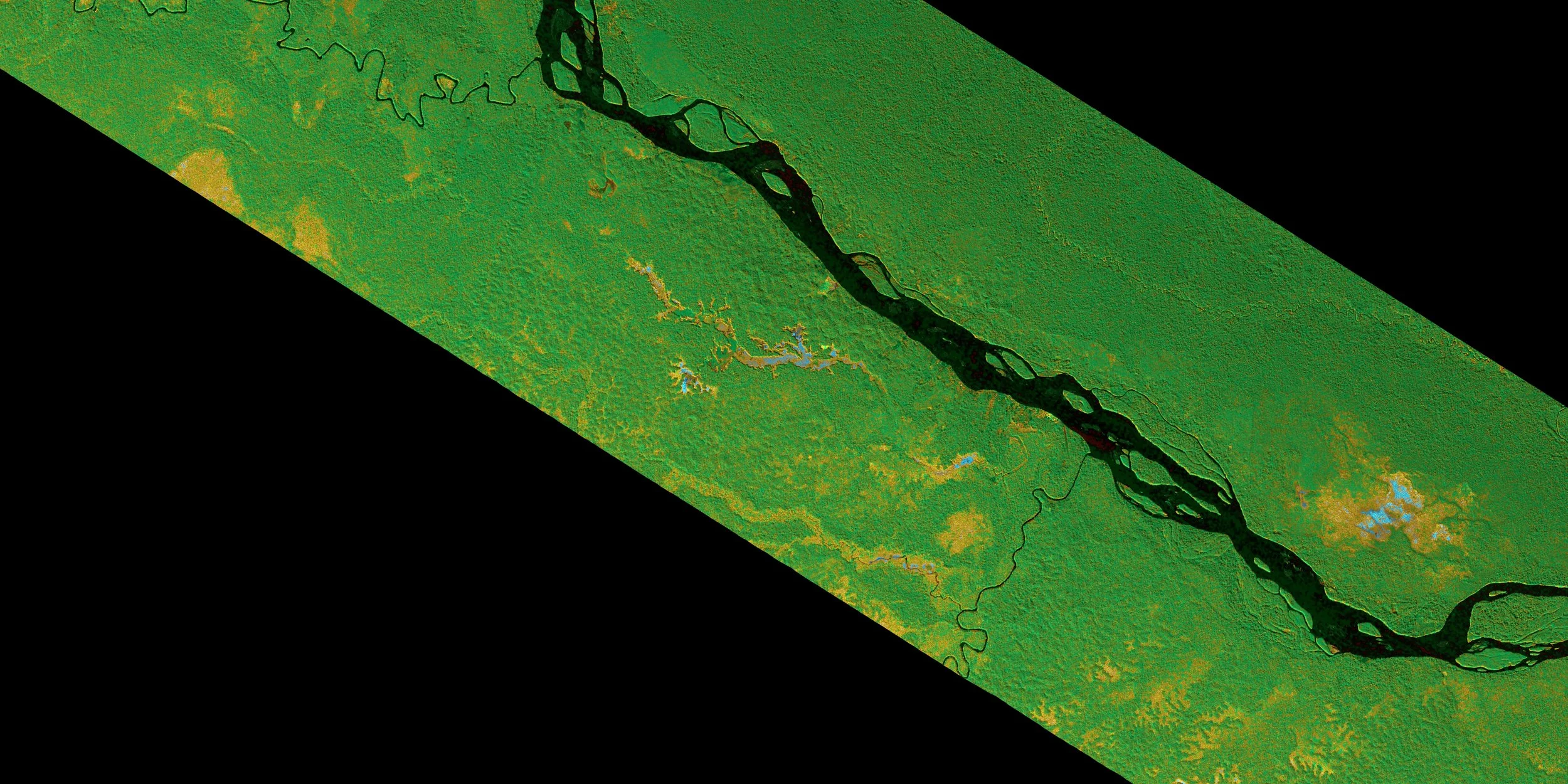 Landsat satellite image showing the Puerto Maldonado river in the southern Peruvian Amazon, winding through a false color composite lush landscape with some smaller water bodies nearby.