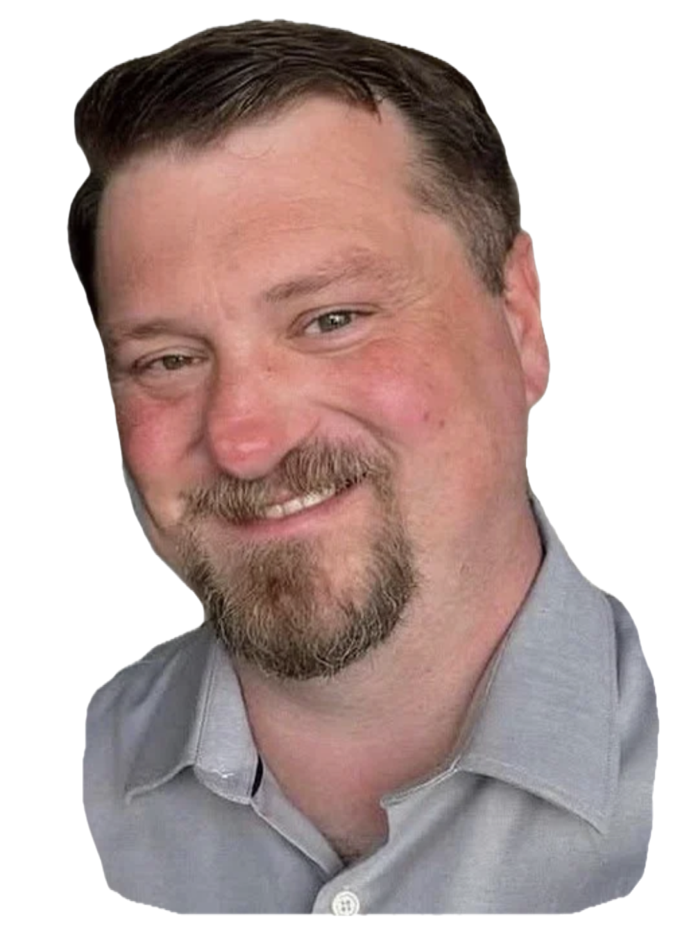 A smiling man with short brown hair, a beard, and wearing a light gray collared shirt.