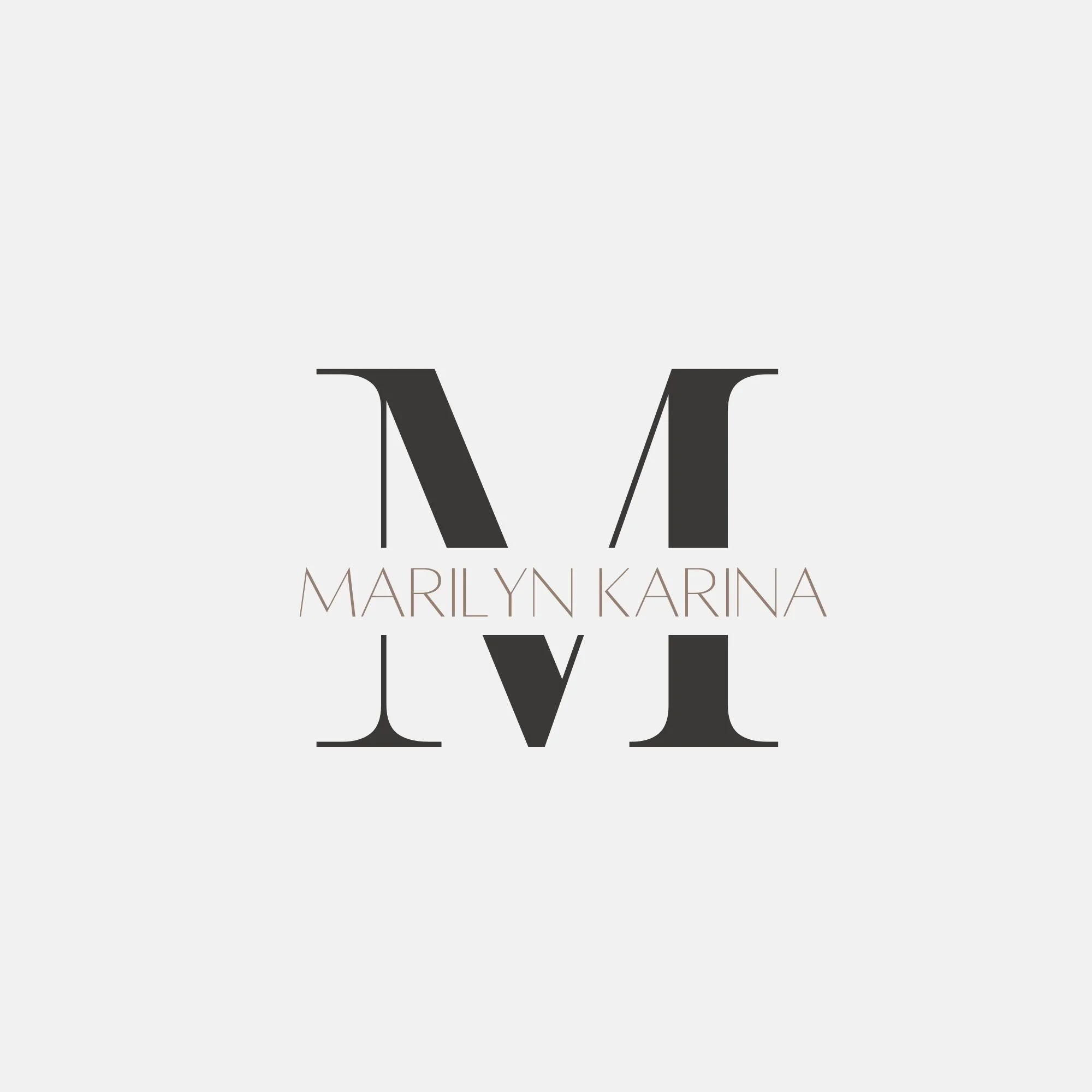Black letter 'M' with the names Marilyn and Karina written below, part of a logo or branding design.