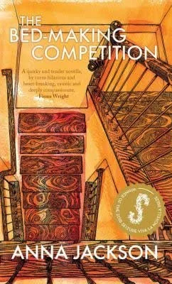 Cover of The Bed-Making Competition by Anna Jackson showing a view of a bedroom with a bed, a rug, and a staircase in warm tones.