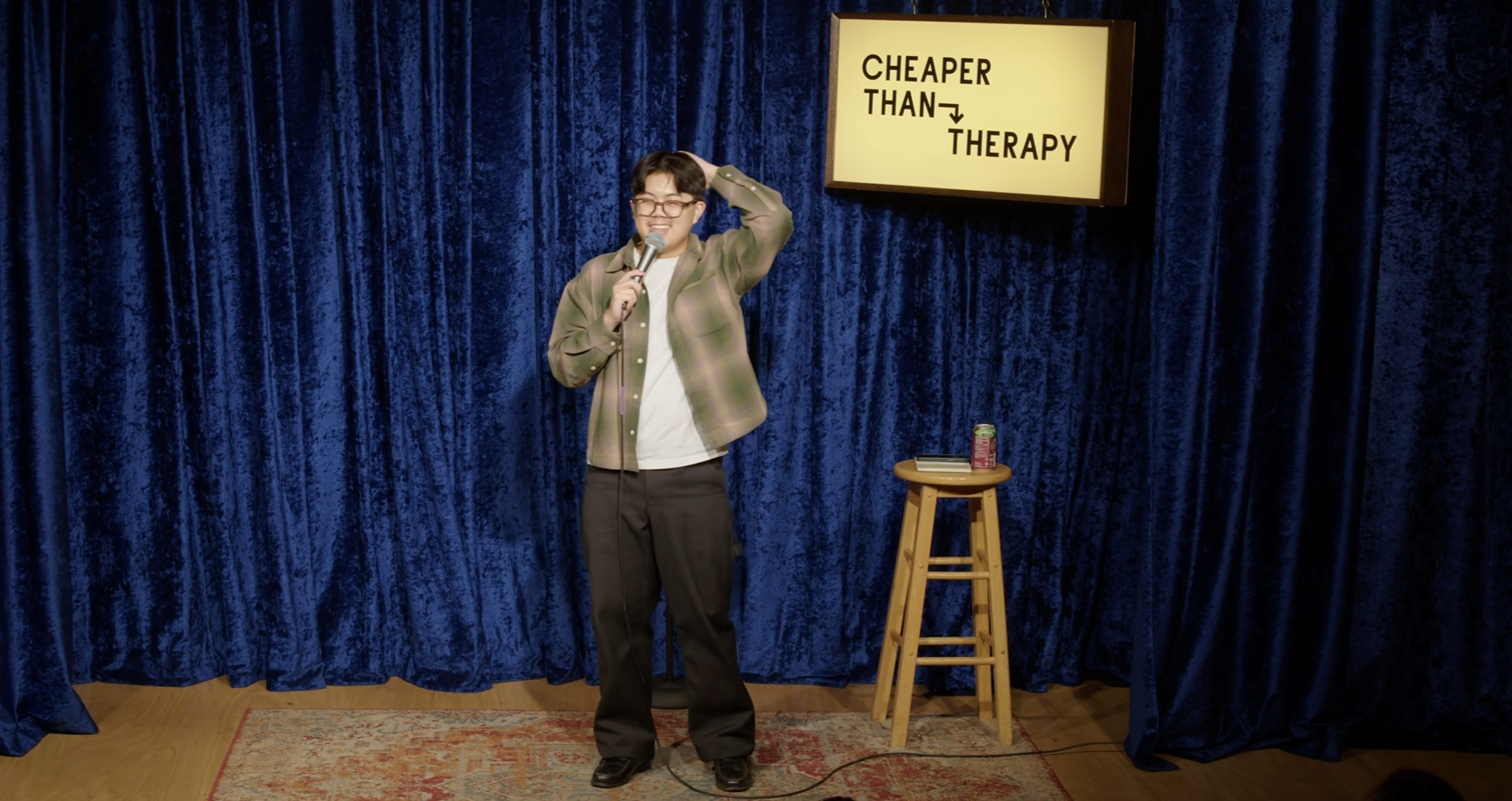 Comedian Peter Bui performing at Cheaper Than Therapy, an independent comedy club in San Francisco.
