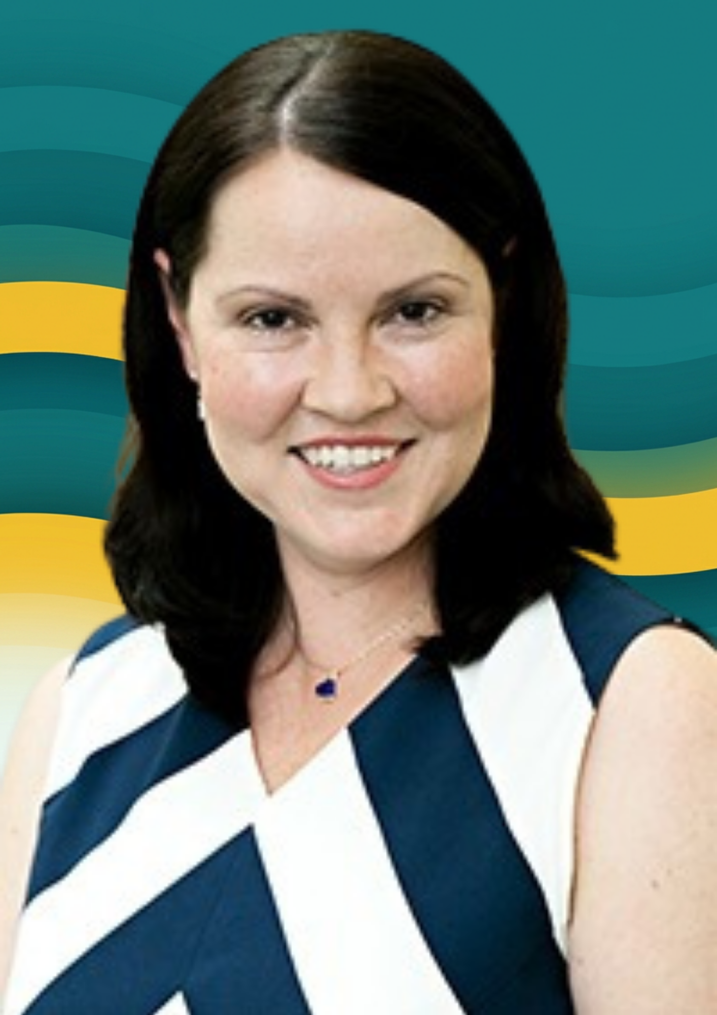 Photo of a smiling woman with dark brown hair, wearing a sleeveless navy and white striped dress, and a blue pendant necklace.