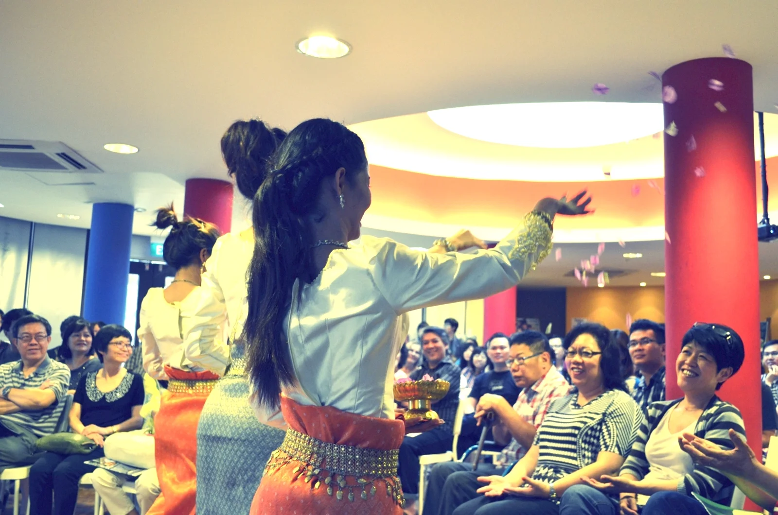 Petals fly in the traditional Khmer blessings dance