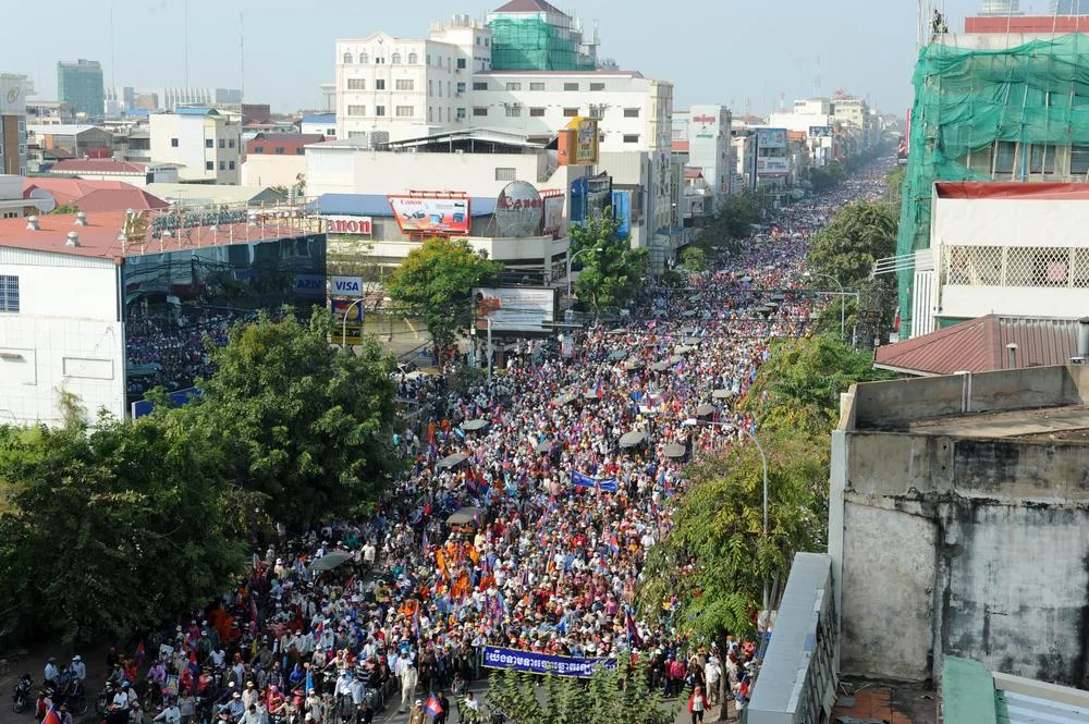December 29, 2013, marchers stretch out for kilometers through the city of Phnom Penh