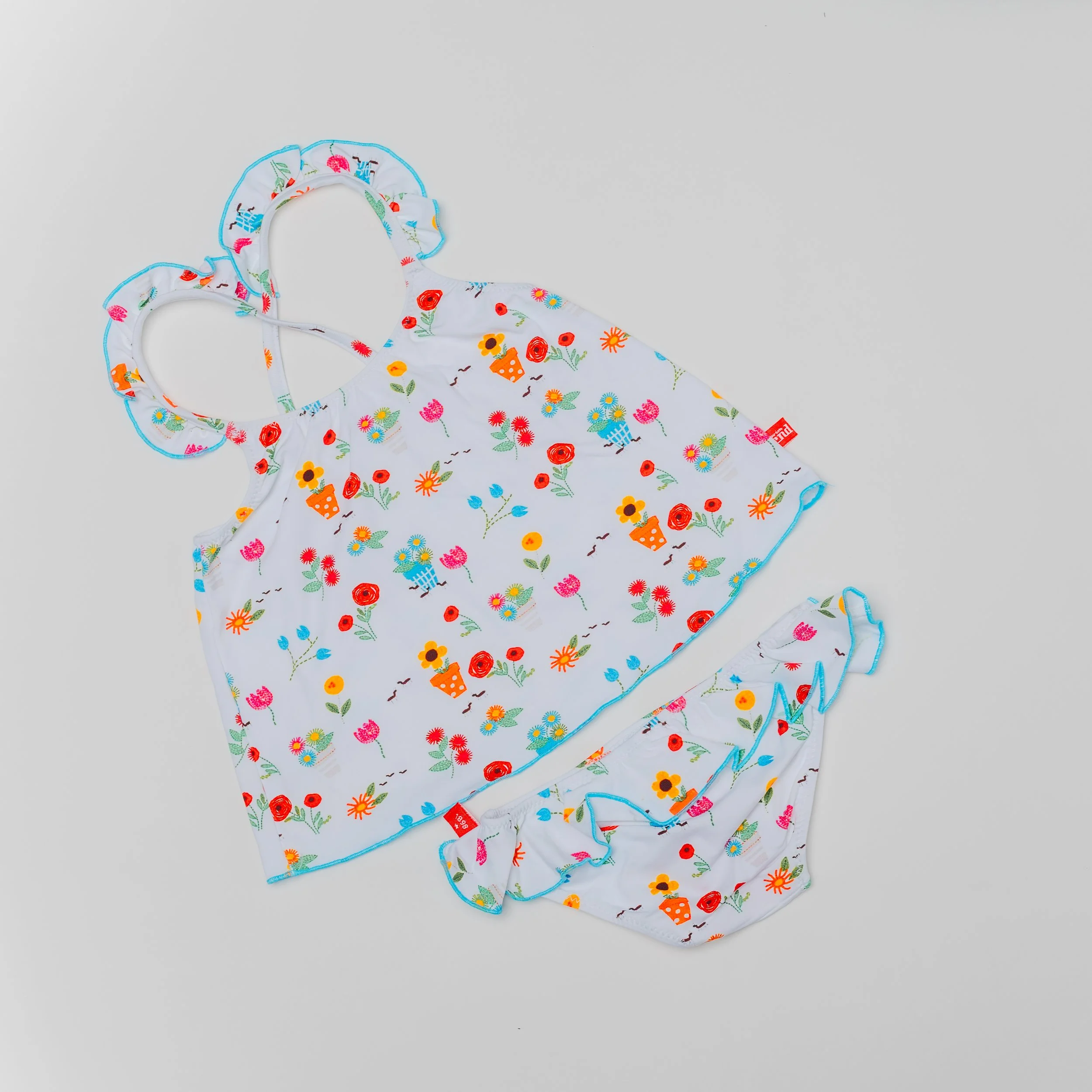 Traje de baño niña flores de colores