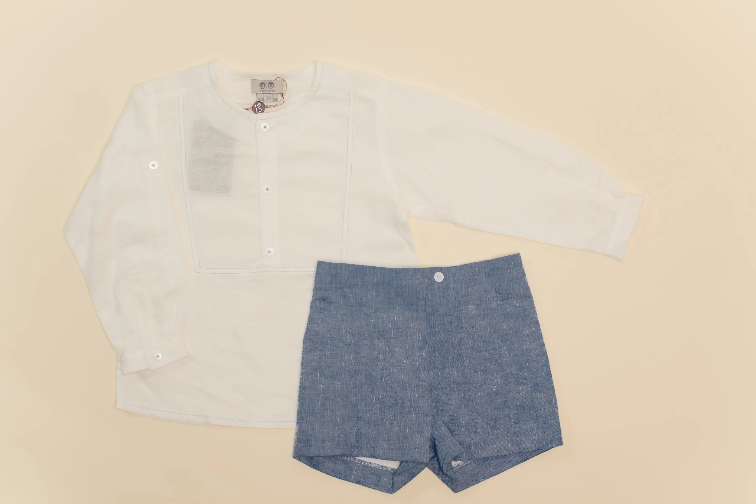 Conjunto JV short azul camisa blanca