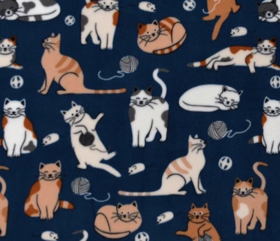 Pattern of illustrated cats, mice, balls of yarn, and cats in various poses on a blue background.