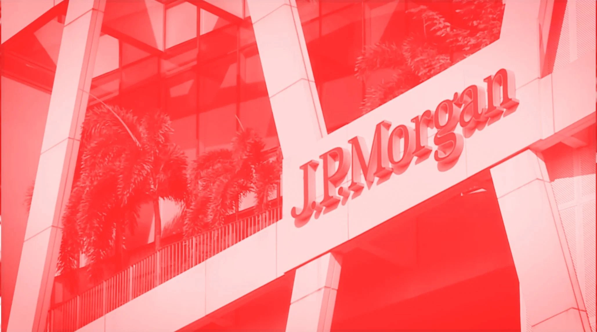The exterior of a modern building with glass windows and palm trees, with the red text 'J. P. MORGAN' on the facade.