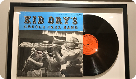 Framed Kid Ory Creole Jazz Band LP with a live performance photograph of the band