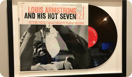 Framed Louis Armstrong and His Hot Seven LP on the Columbia label
