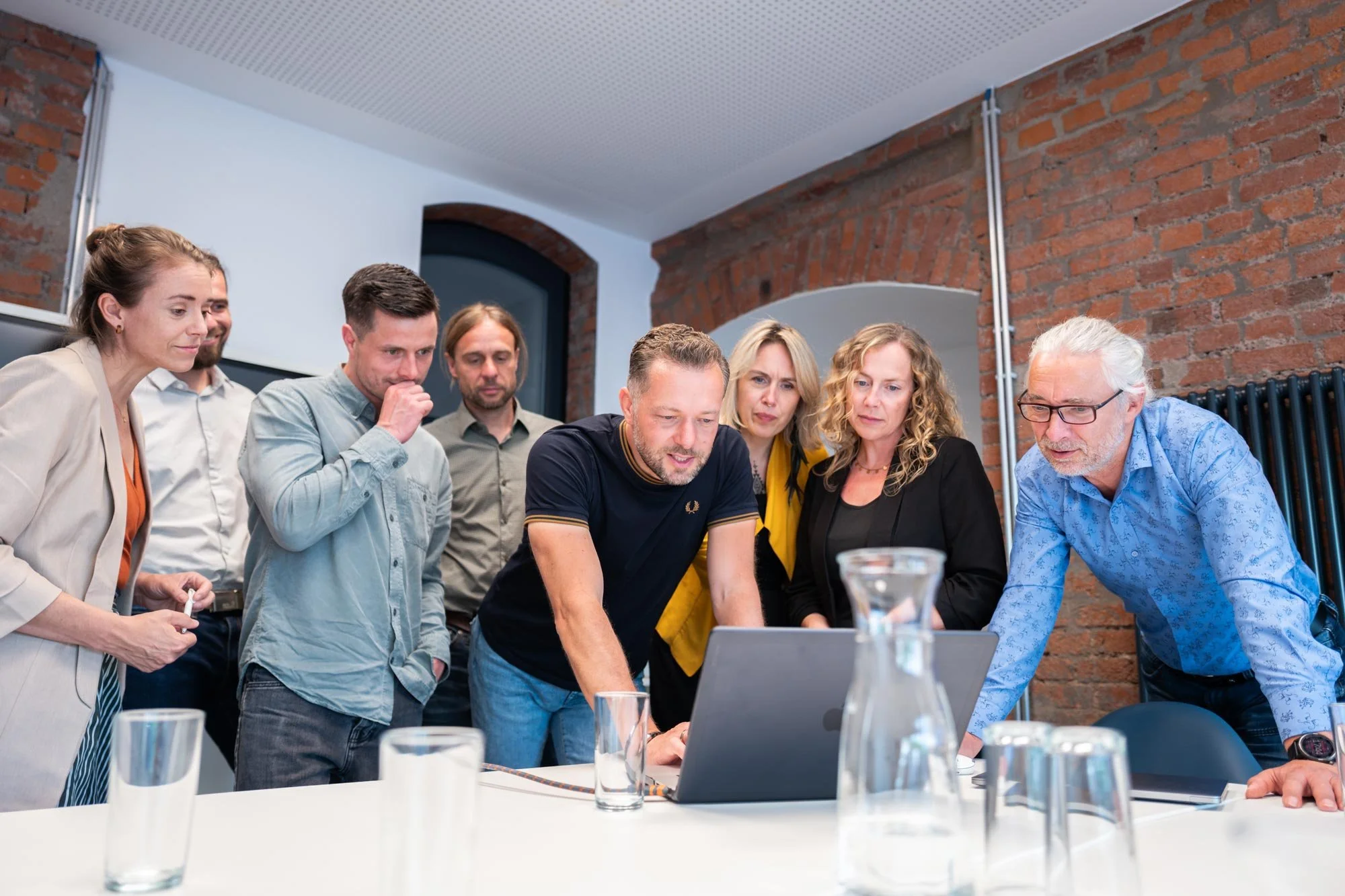 Workshopgruppe bei gemeinsamer Ergebnisbesprechung im IT-Projekt