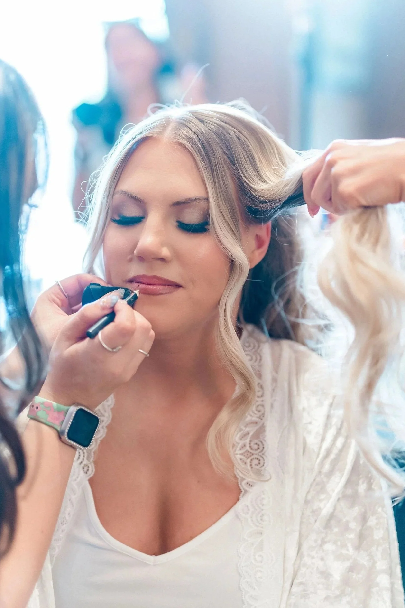 Getting ready for a styled shoot at a Las Vegas wedding venue, Desert Inn Oasis, with Desi Camille Wedding Planner, Kristen Marie Photography, and Amelia C & Co Hair and Makeup