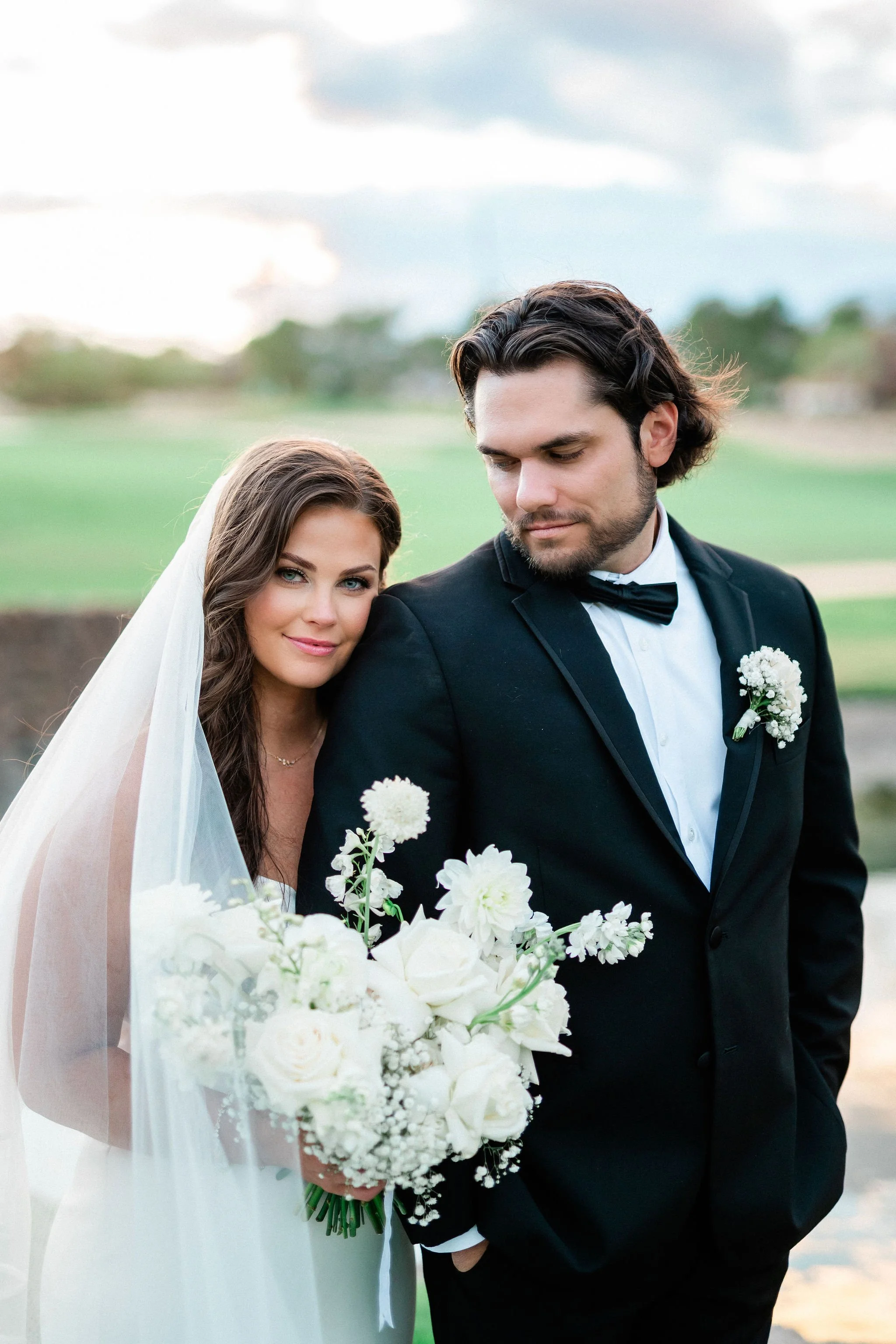 Bride and groom portrait at Canyon Gate Country Club Las Vegas wedding, hair and makeup by Marai A for Amelia C & Co, photography by Kristen Marie Weddings, florals by Blooming Belles
