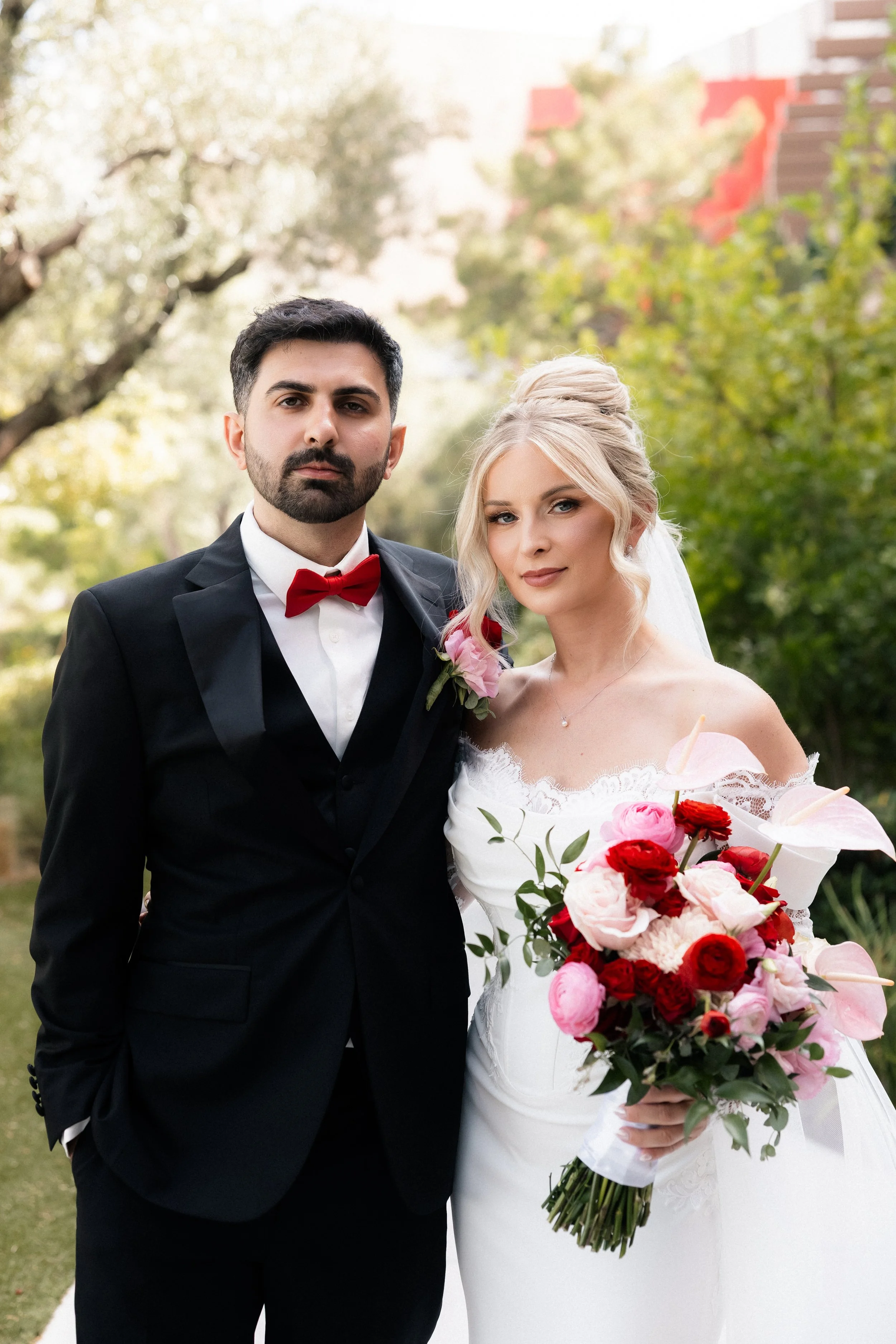Bride and groom portrait at Resorts World Las Vegas wedding, bridal hair by Katie A and makeup by Aimee A for Amelia C & Co, photography by Risky Exposure