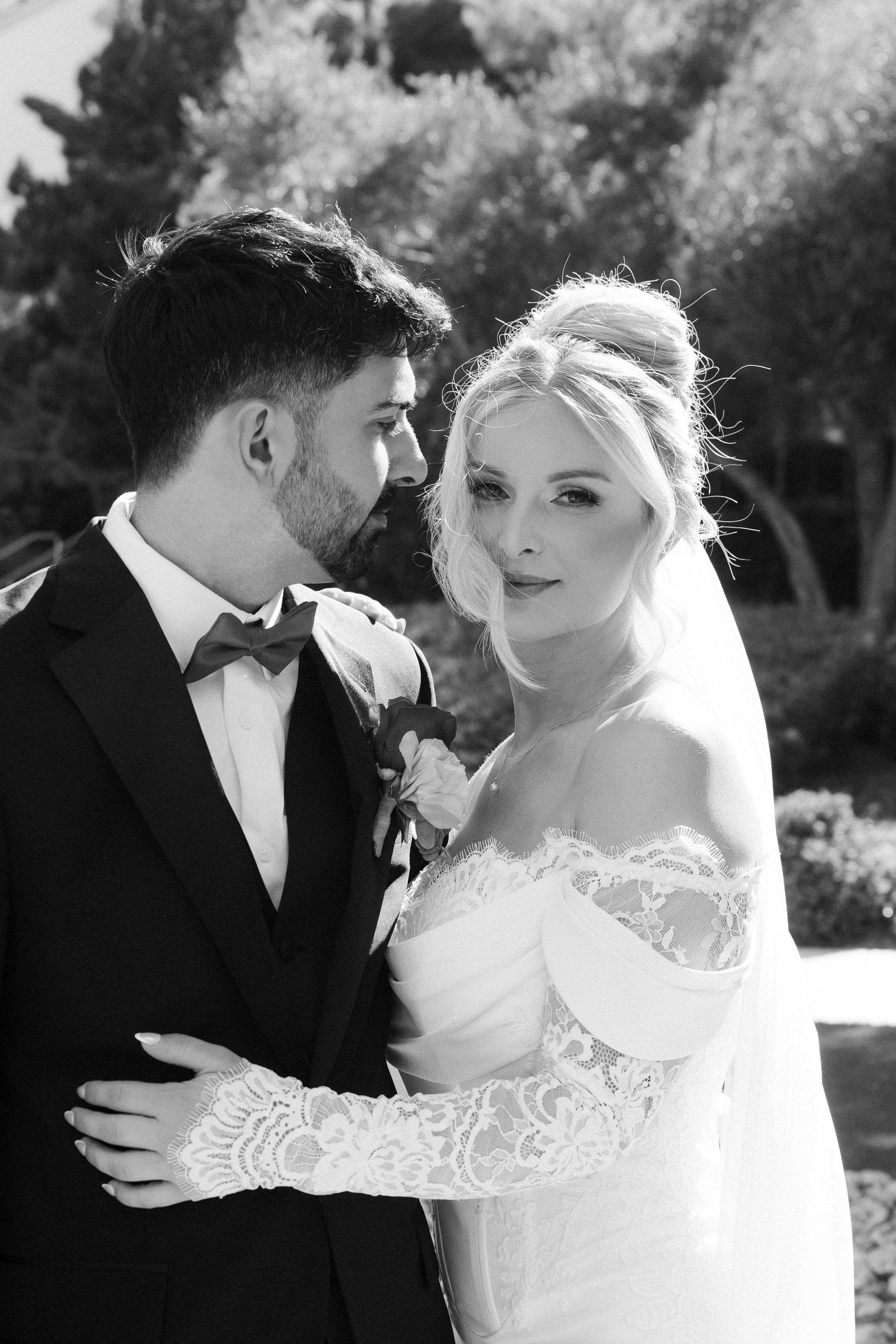 Bride and groom intimate portrait at Resorts World Las Vegas wedding, bridal updo and soft glam makeup by Amelia C & Co, hair by Katie A and makeup by Aimee A, photography by Risky Exposure
