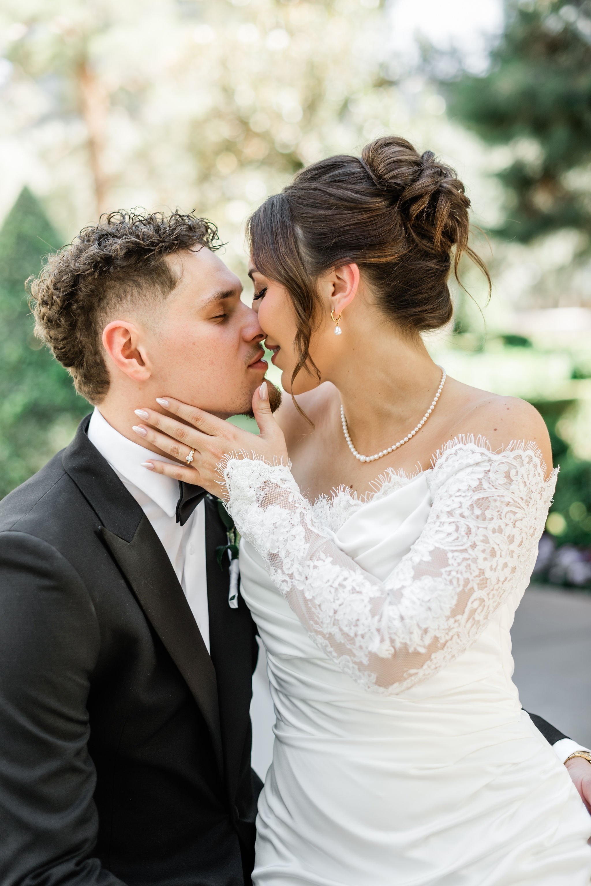 Close-up of bride Jessica and groom Lukas almost kissing at Hard Rock Hotel Las Vegas wedding, hair by Katie and makeup by Aimee for Amelia C & Co, photography by Liz Le