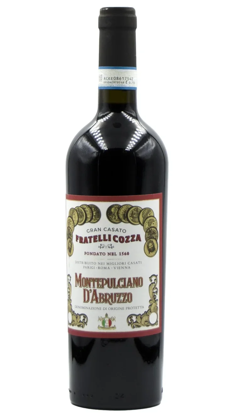 A bottle of Montepulciano d'Abruzzo red wine with a white label and gold decorative accents.