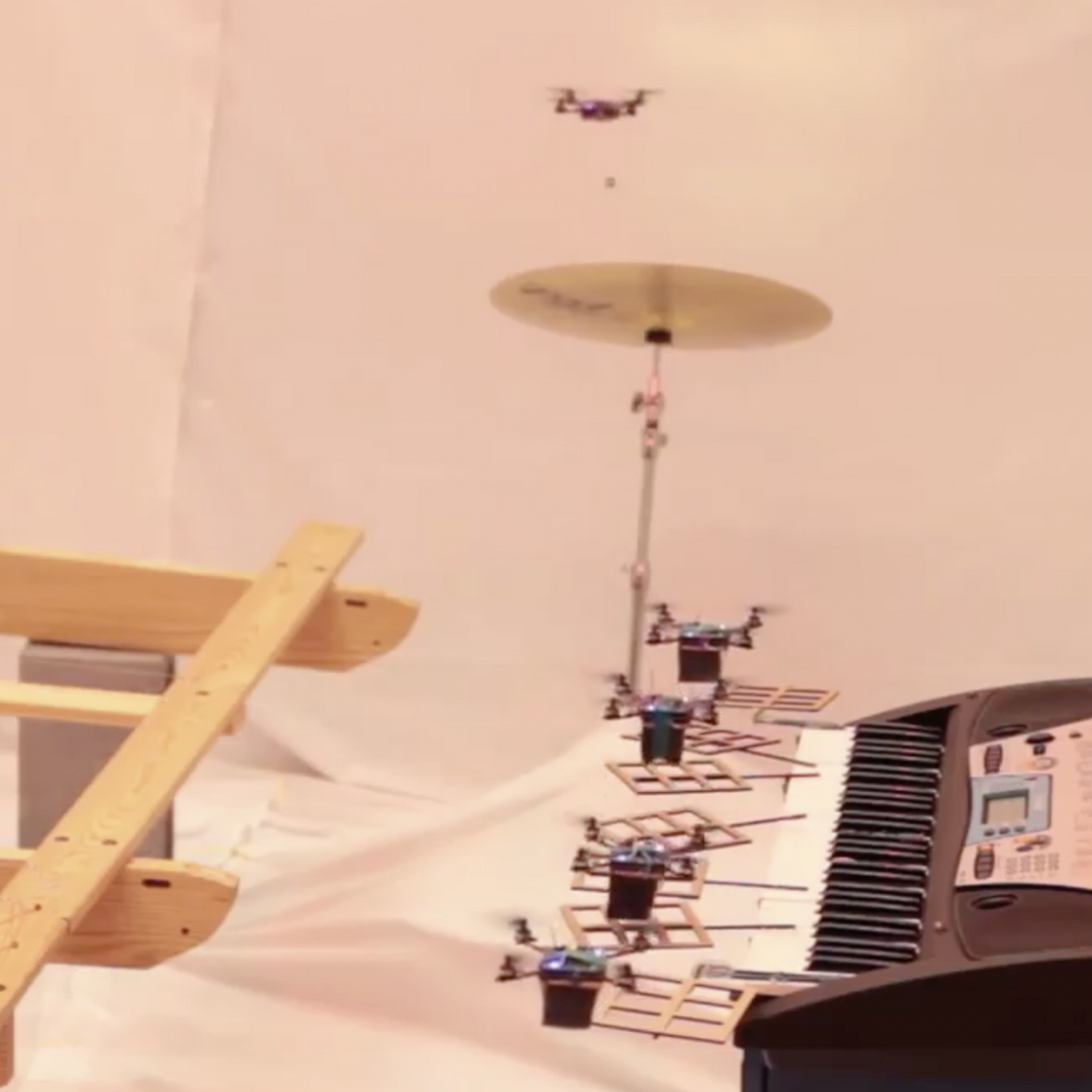A group of flying robots plays the James Bond theme song.
Credits: Video editing.