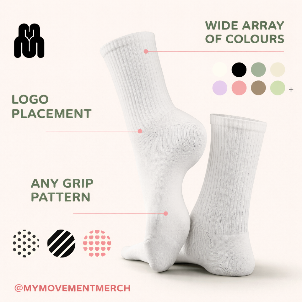 Image showcasing white socks with customizable features such as wide array of colors, logo placement, and grip patterns. The image also displays a minimalist logo at the top left corner and the social media handle '@MYMOVEMENTMERCH' at the bottom left.