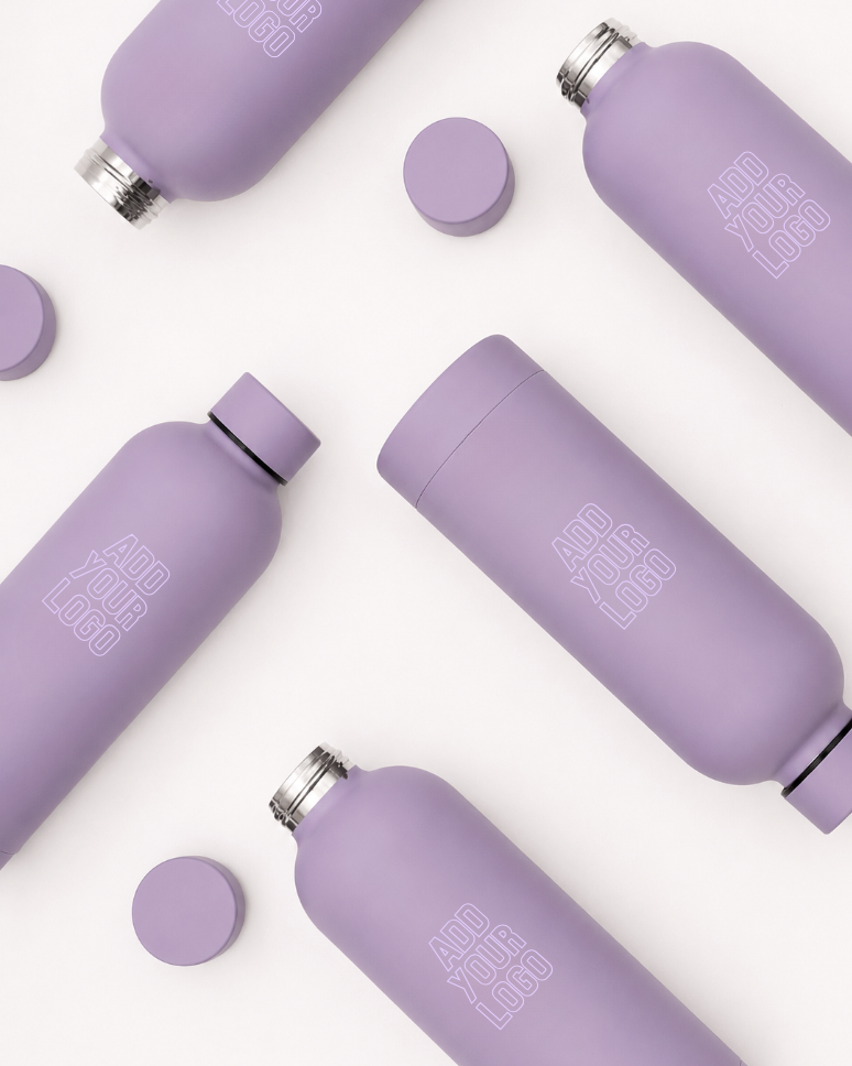 Six lavender-colored reusable water bottles with screw-on caps, arranged on a white background. Three bottles have the caps on, and three are without caps, showing the metal spouts. Some bottles have placeholder text that says 'ADD YOUR LOGO'.