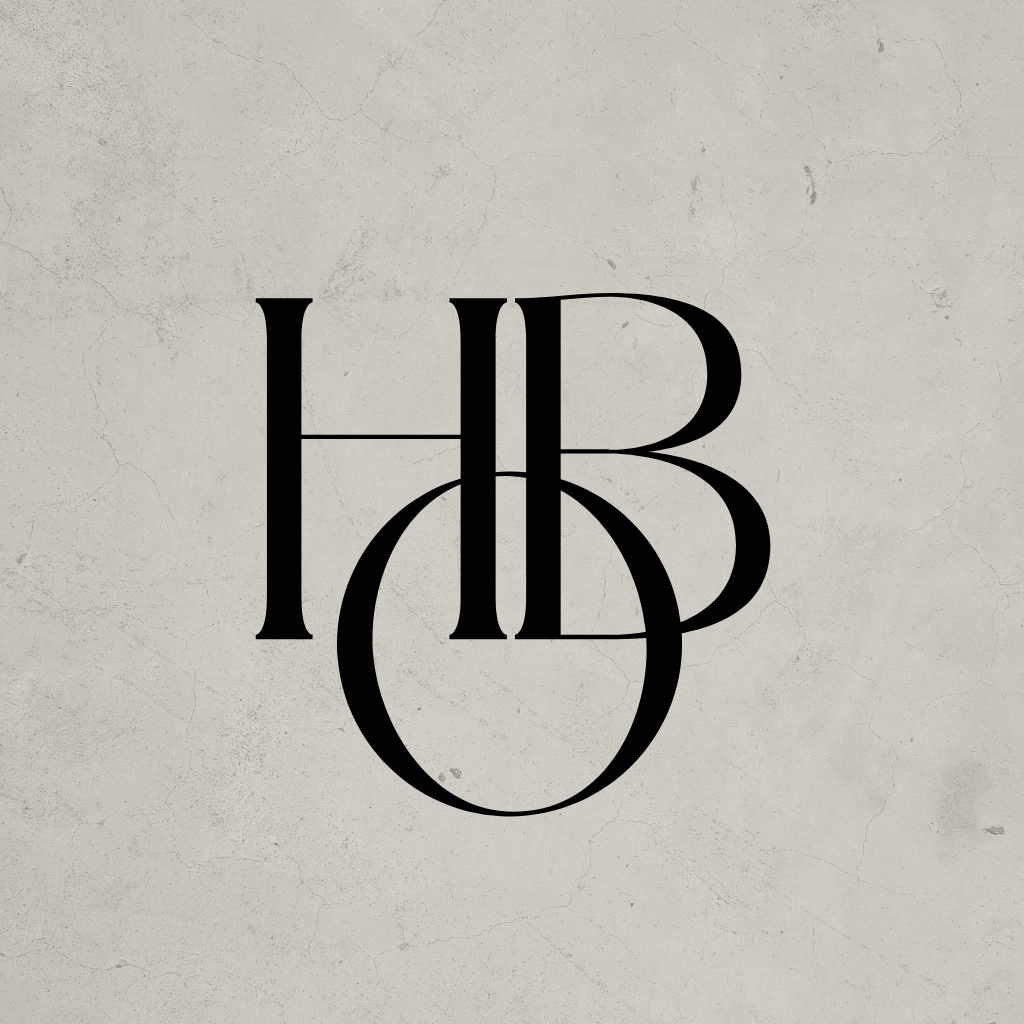 Stylized monogram with the letters H, B, and O in black on a textured gray background.