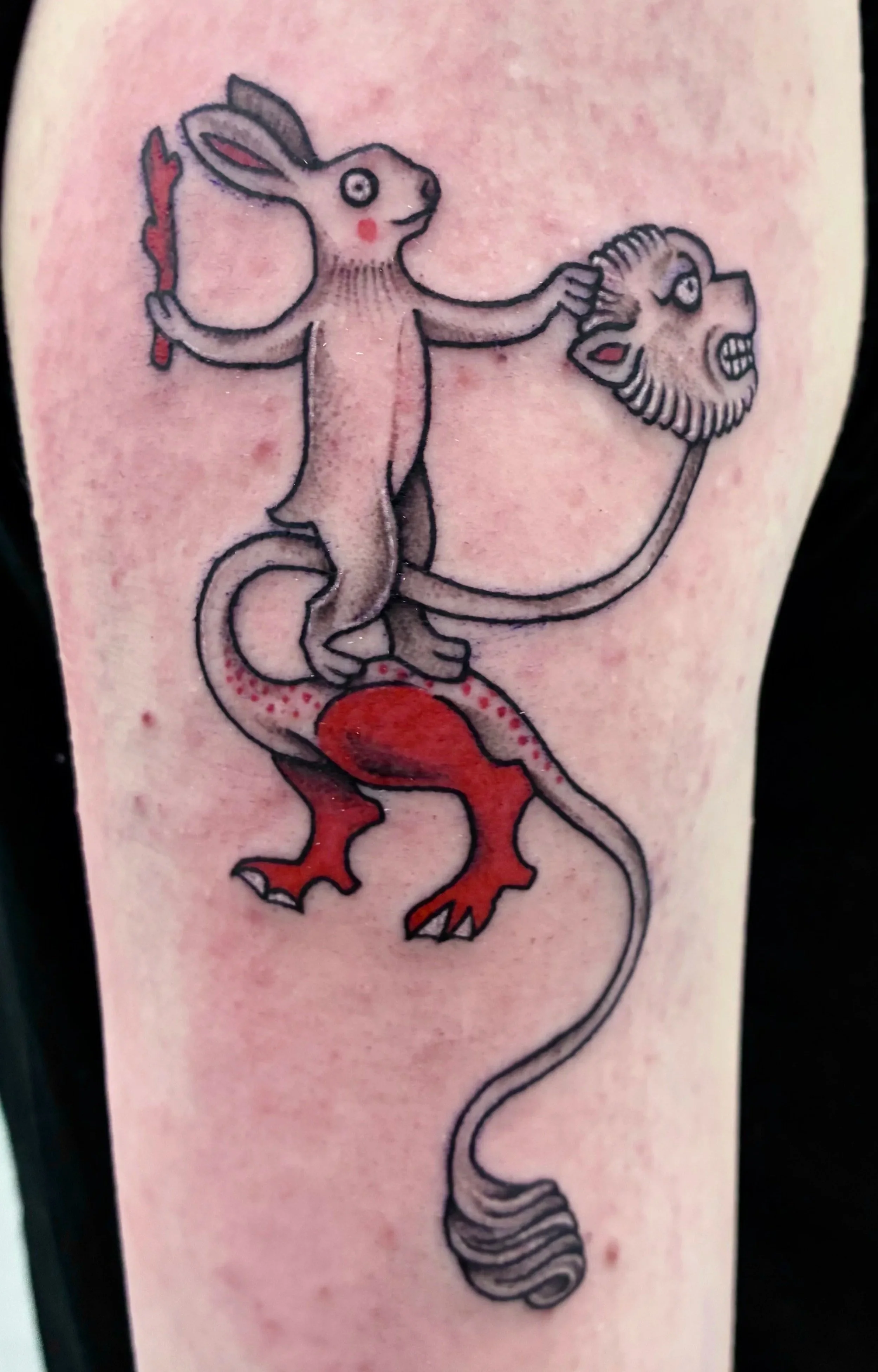 Fineline blackwork tattoo of a rabbit holding a severed demon head, riding a red-legged creature, medieval bestiary style