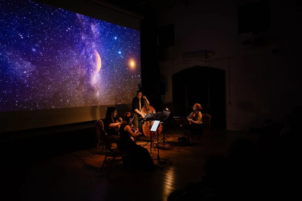 The Pale Blue Dot Tour:

Reimagines NASA's Voyager Golden Record, combining contemporary Irish music with musical traditions from Japan, Azerbaijan, Bulgaria, and Benin, exploring the sounds and stories that represent life on Earth.

Just a little ov