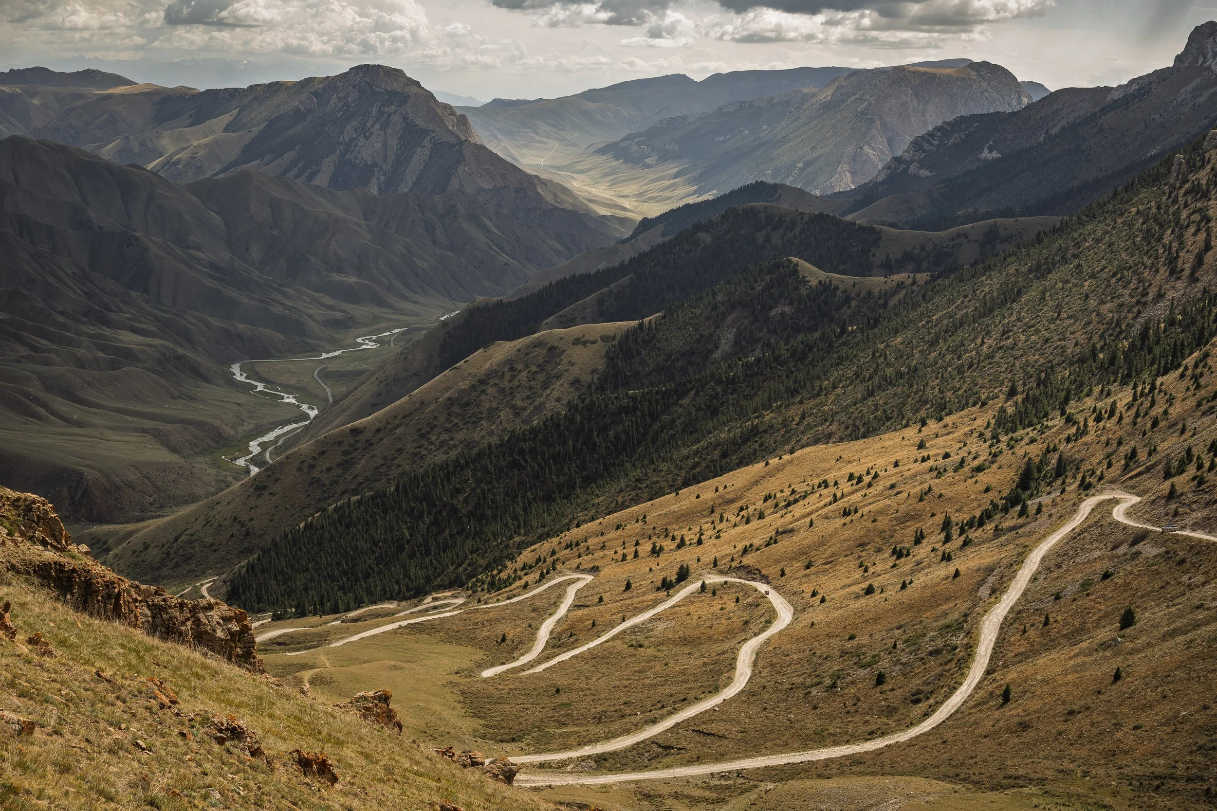 The famous 33 Parrot pass en route from Son Kul to Naryn - where the road looks like it blends into the river below