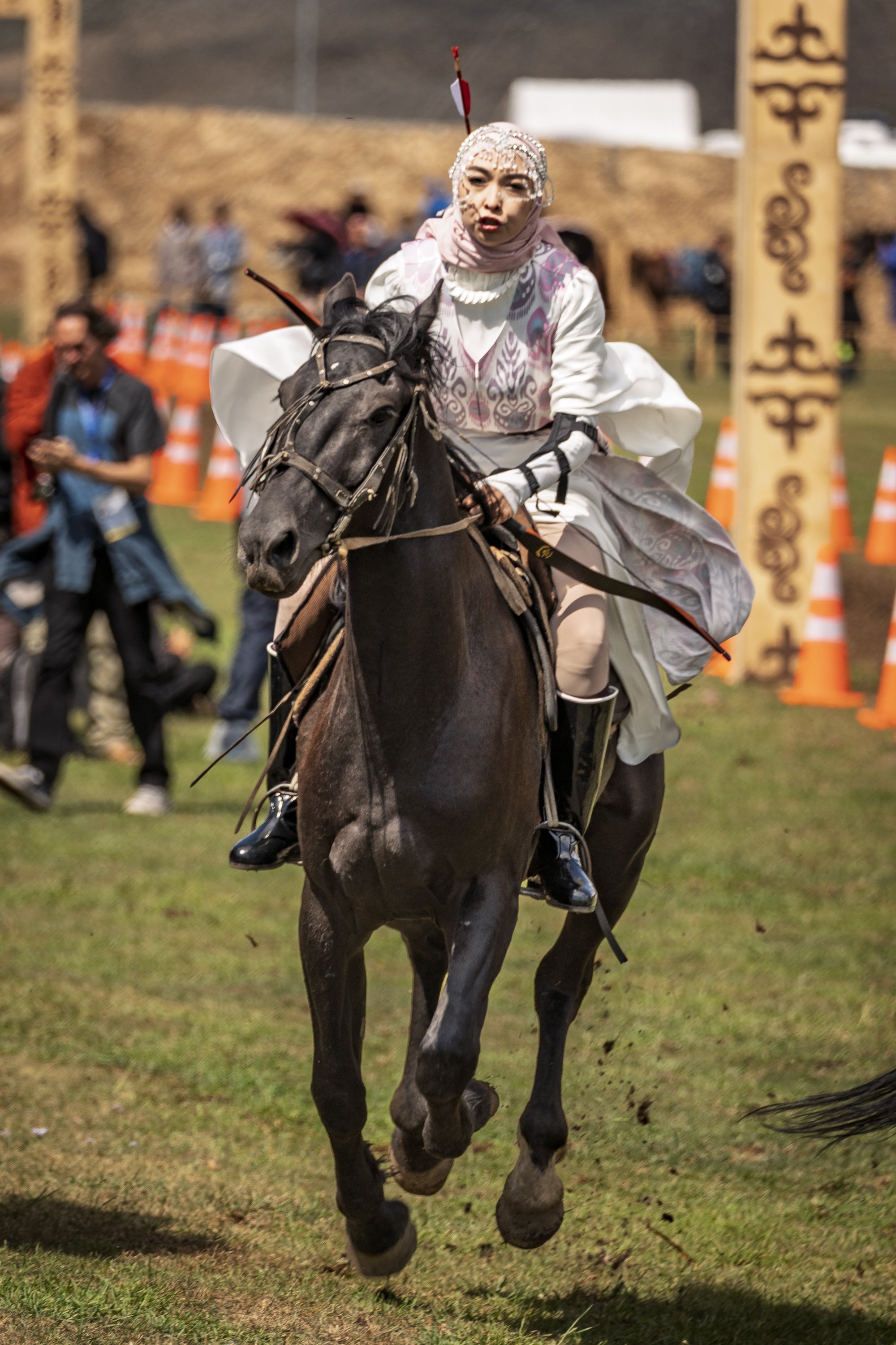 An Uzbek horseback archer runs the course at Kyrchyn Gorge