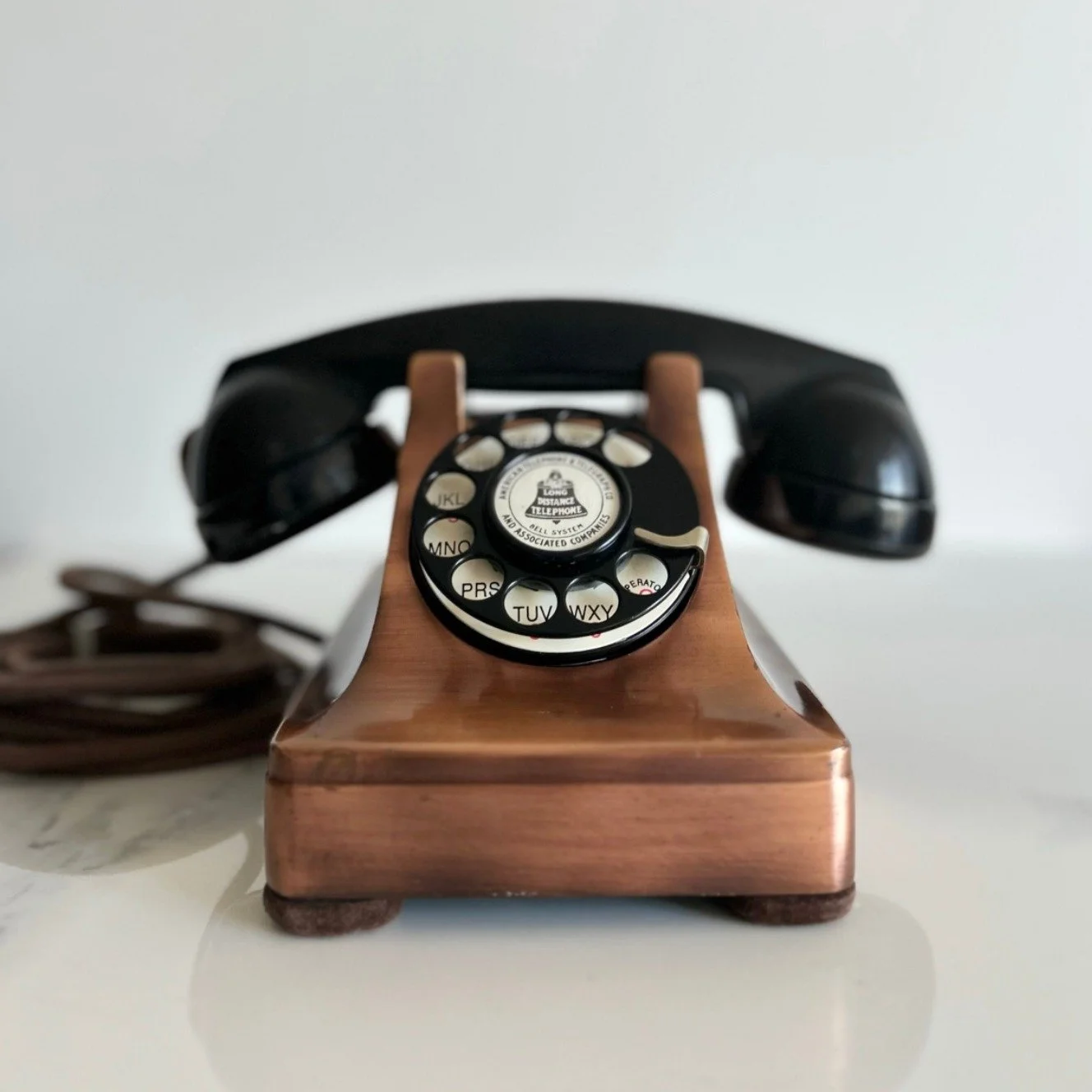 We can't get enough of the charm of our authentic, 1930s Canadian vintage telephone!

This refurbished phone has a neutral copper that would suit the aesthetic of any occasion.