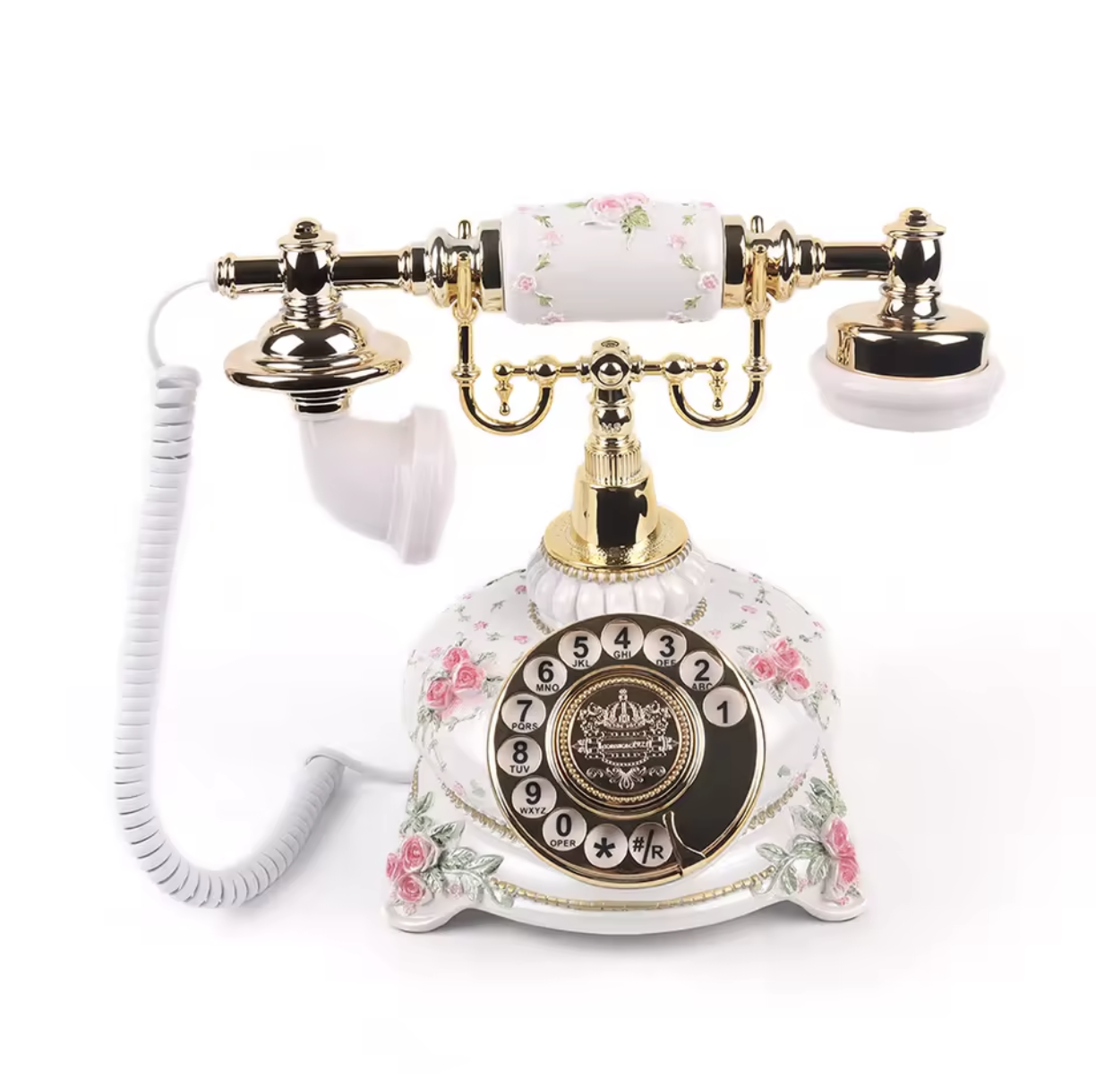 Decorative vintage rotary telephone with floral and gold accents.