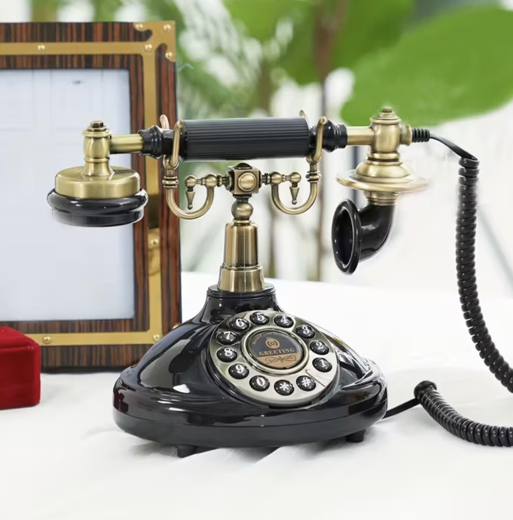 A black vintage telephone