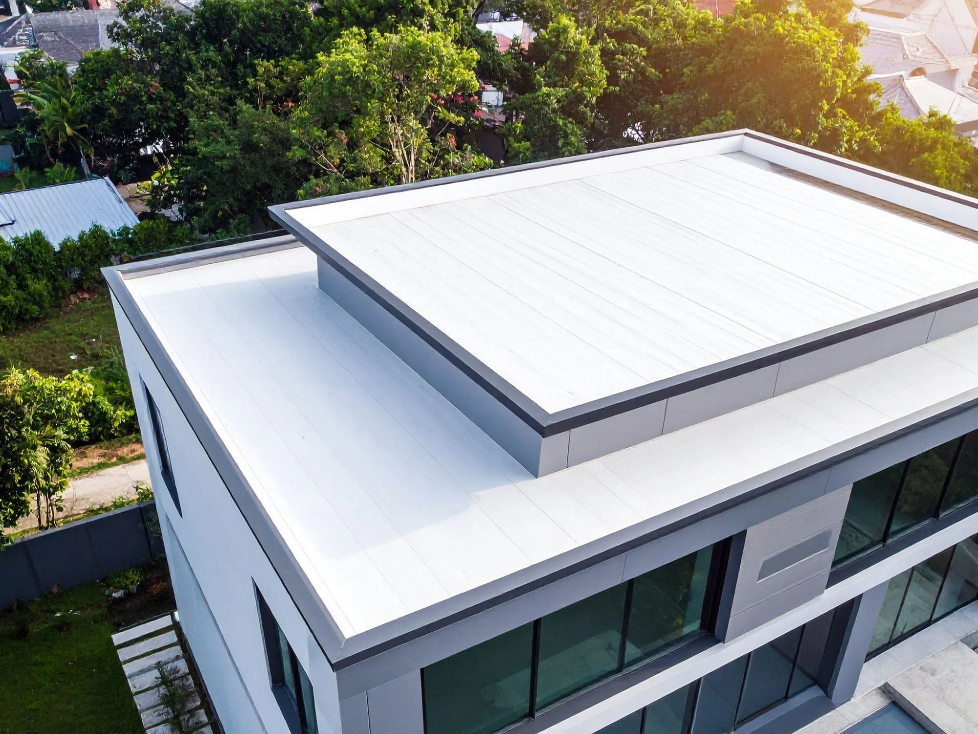 house with flat roof - questions to ask a roofer