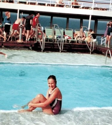 An older picture of 10 year old Stephanie Ng posing by the pool on board Royal Caribbean.