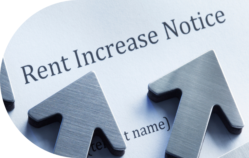 A photograph depicting a document titled “Rent Increase Notice”.