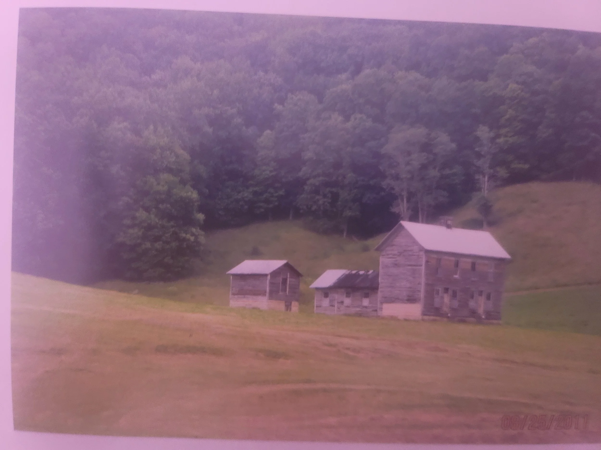 Photo of the old Kelley Farmhouse before retouched