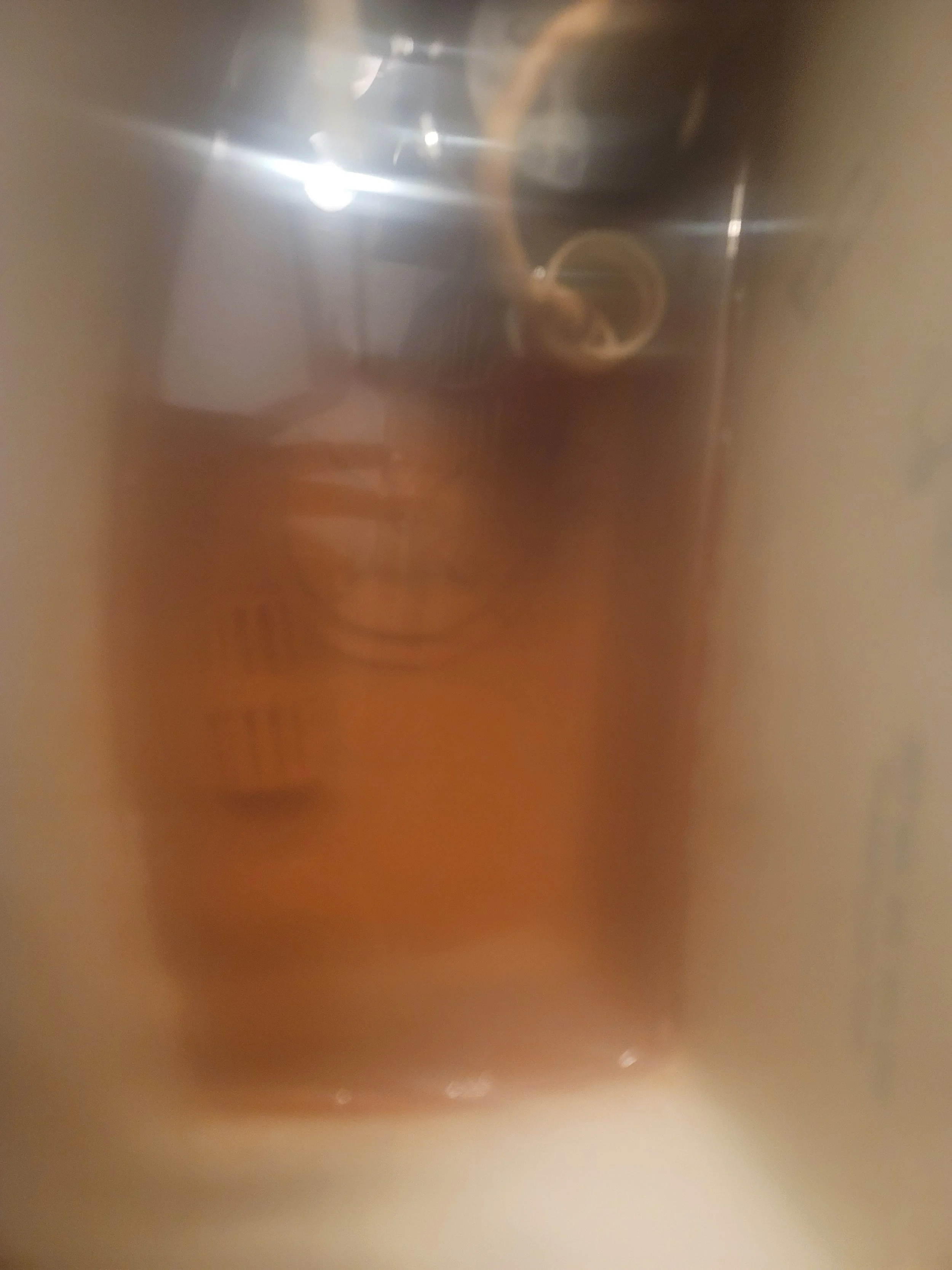 Tank holding orange water after treatement
