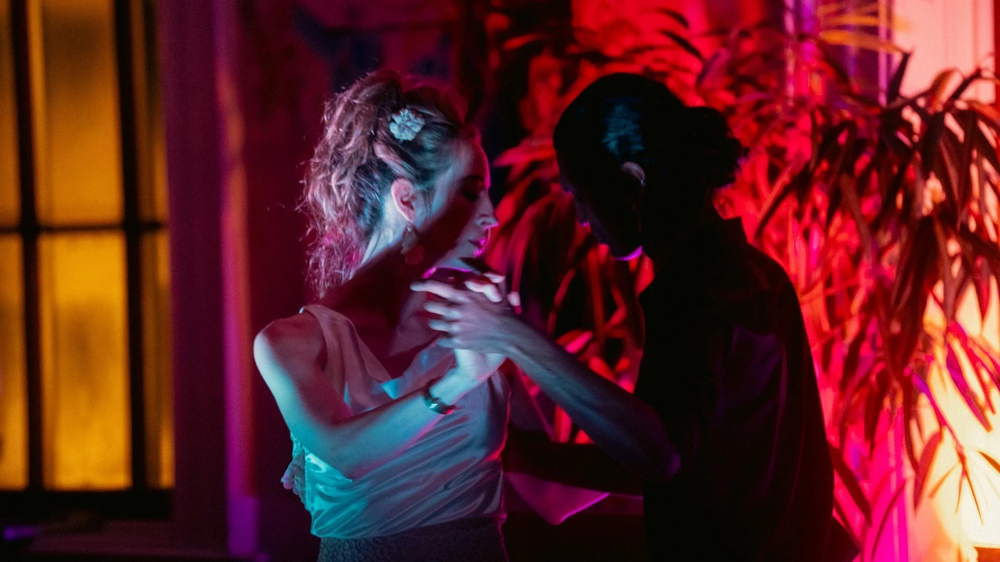 Human connection and human expression at RAW uncensored storytelling, as a man and woman dance the tango