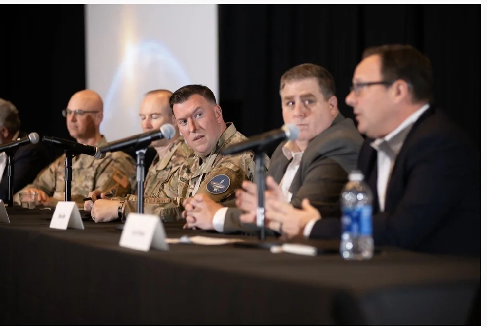 Woody taking part in a panel during his Army service