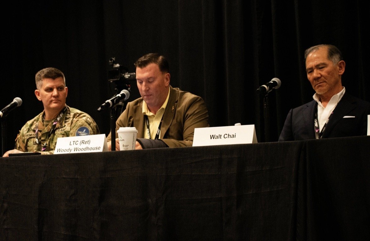 Woody sharing his perspective at an industry panel after his military service.