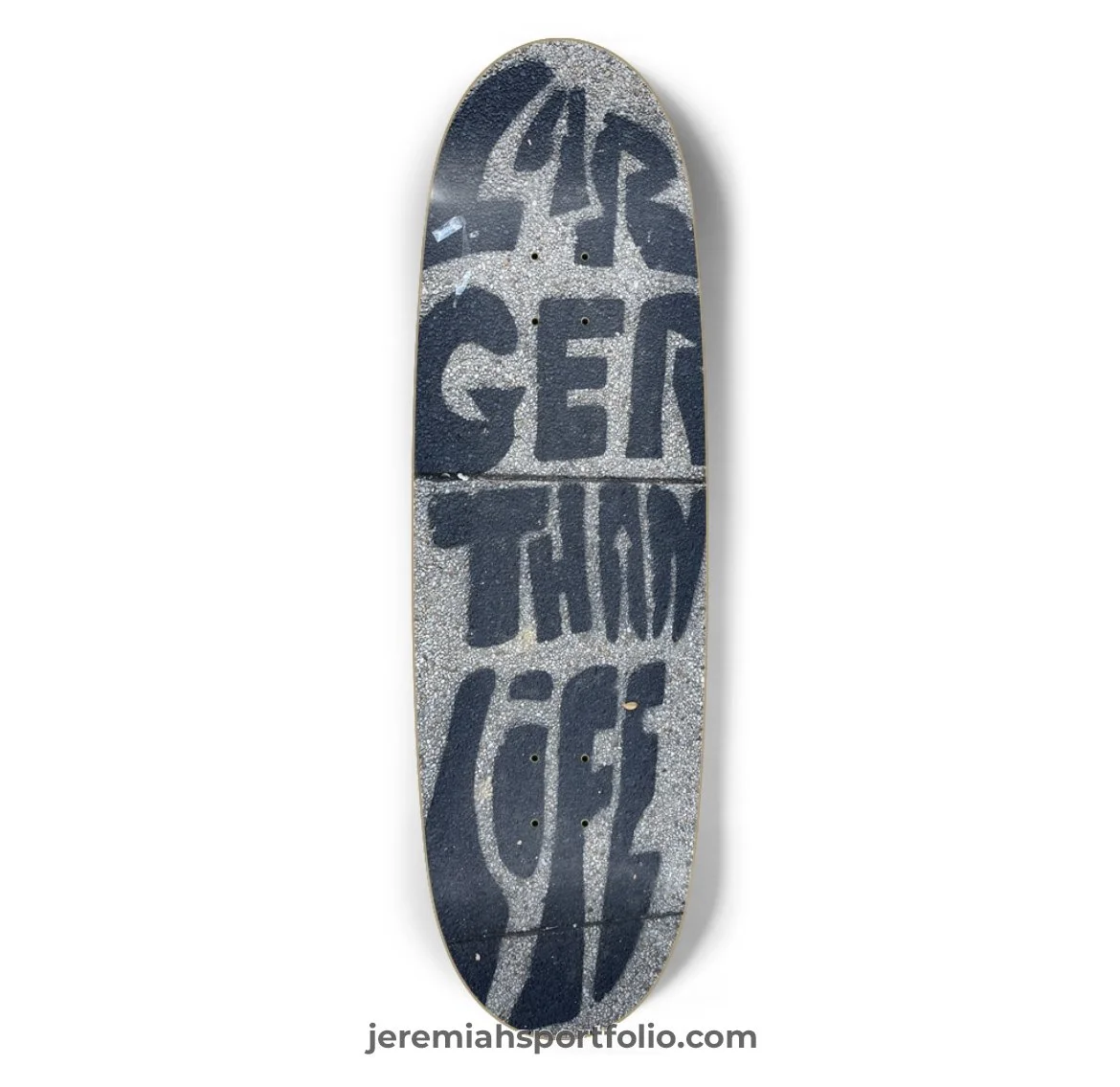 Skateboard deck with black and white design and text '4D GENT THOUS C' on a white background.