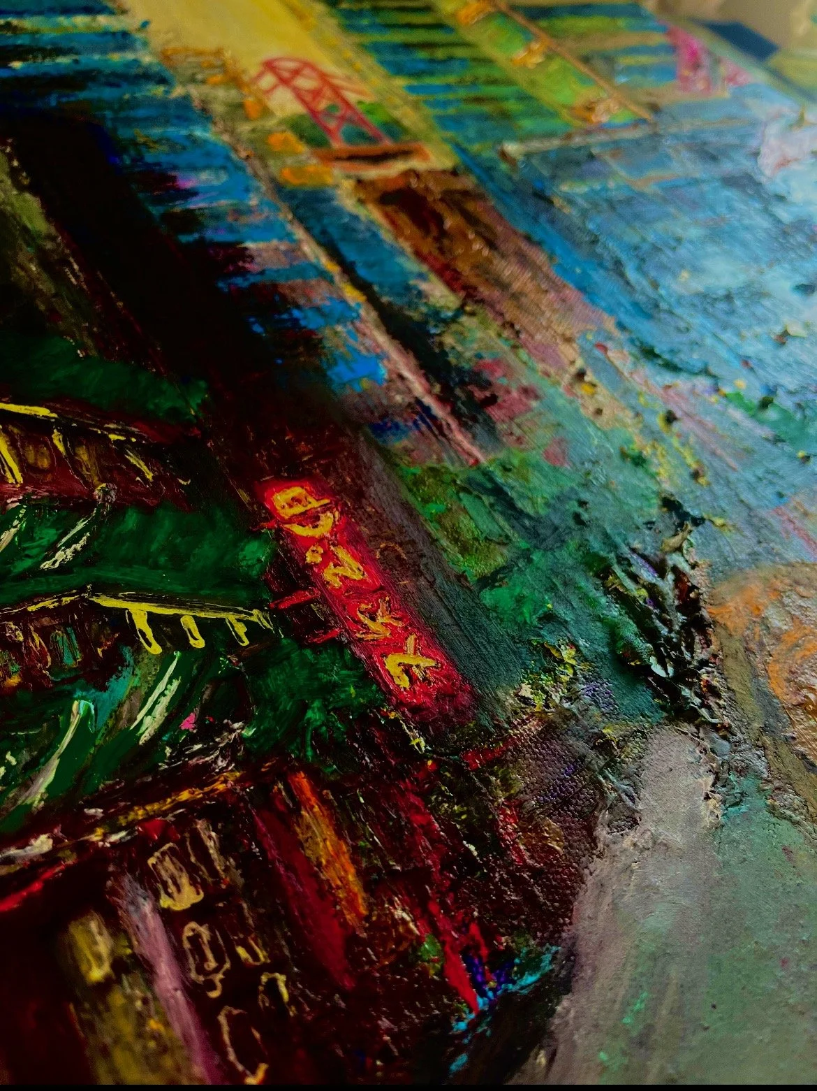 Close-up detail of a textured oil painting of a city street scene with neon signage, in blues, greens, and reds.