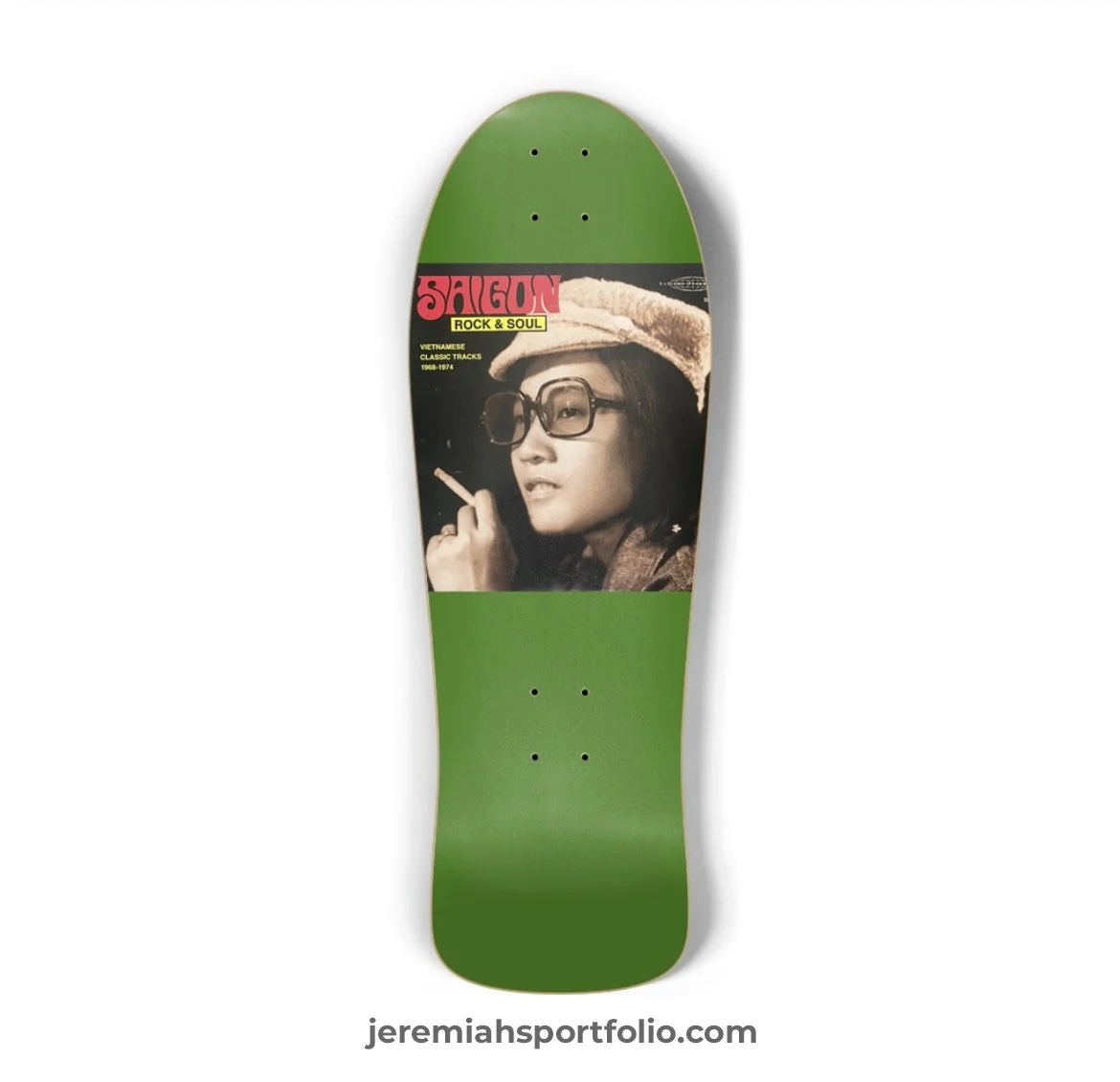 Skateboard with a black and white photo of a woman wearing glasses and a hat, holding a cigarette, with a green background and red and yellow text reading "Saucy Rock & Soul" and "Vietnamese Classic Tracks 1968-1974."
